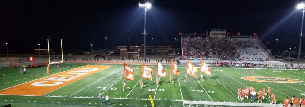 Monday Night Football This Week: Preview and What Is at Stake Football stadium under floodlights at night