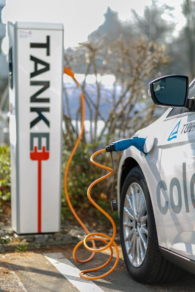 Solid-State Batteries Enter Electric Vehicle Pilot Production An electric car at a charging station
